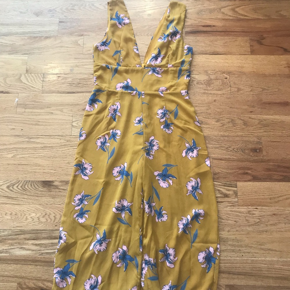 Mustard yellow jumpsuit with flowers